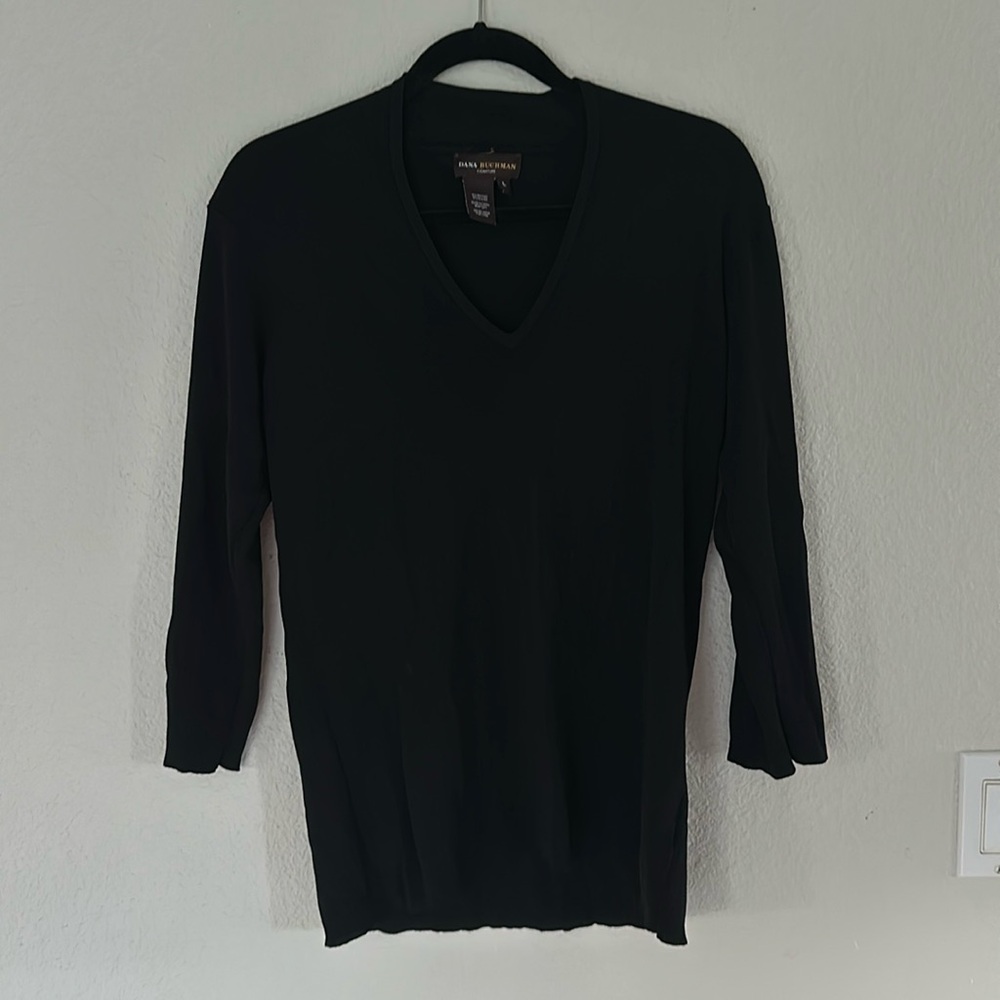 Black light with V neck sweater.